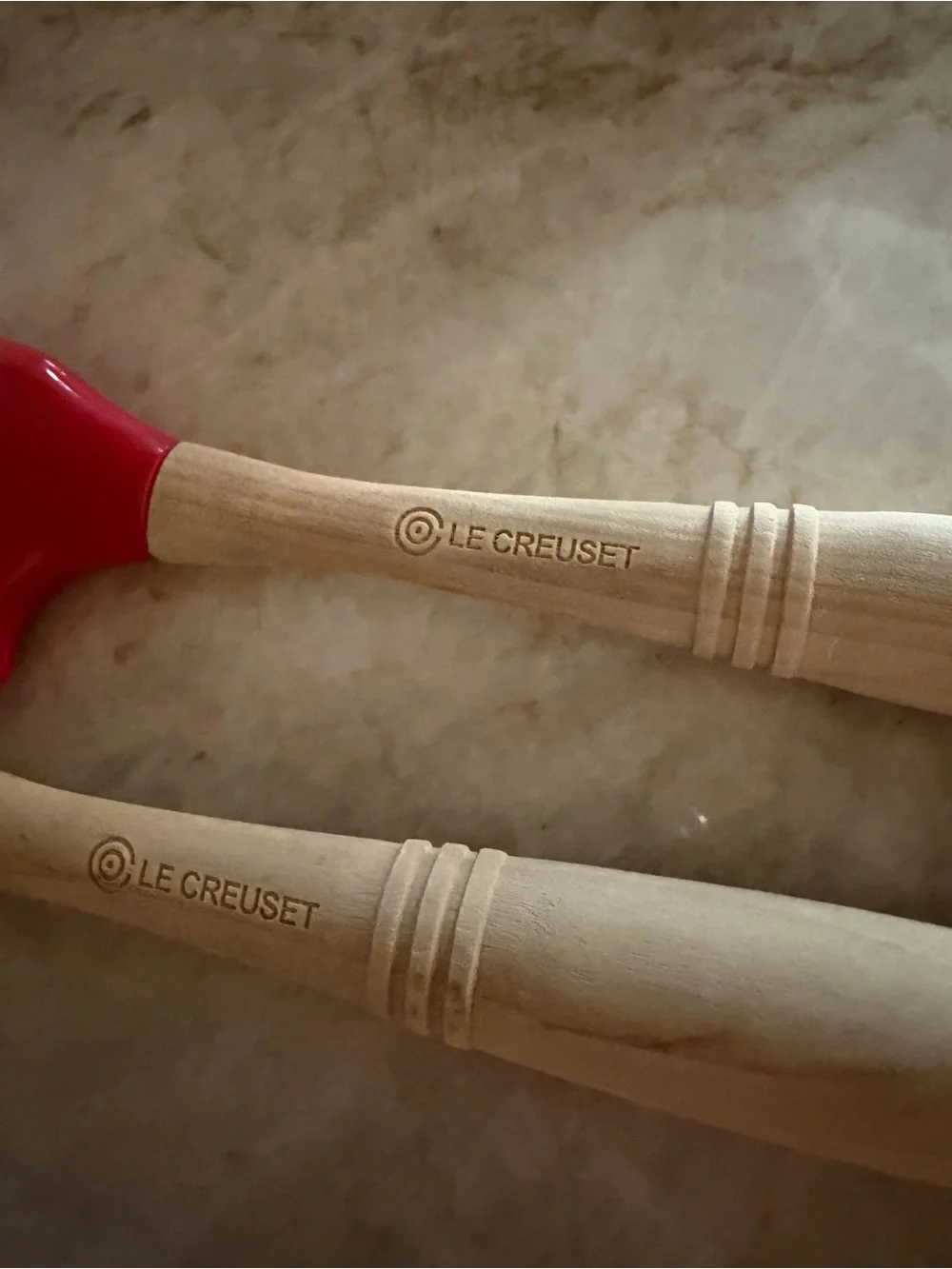 Le Creuset silicone mixing spatulas in Cerise (red)
